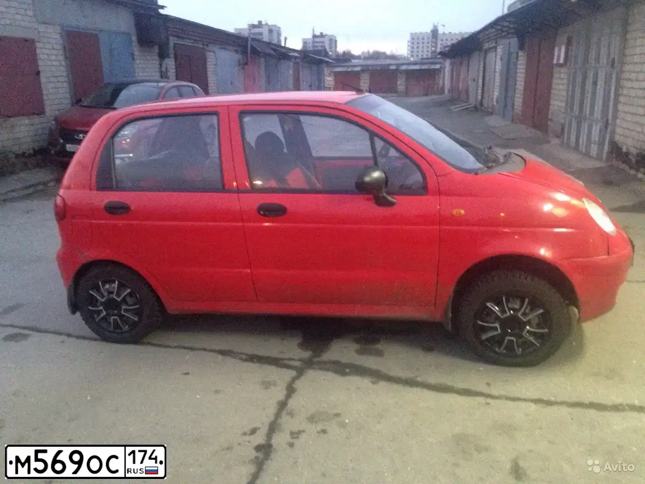 Фото автомобиля DAEWOO O MATIZ, 2006 — госномер М569ОС174. Цвет: КРАСНЫЙ