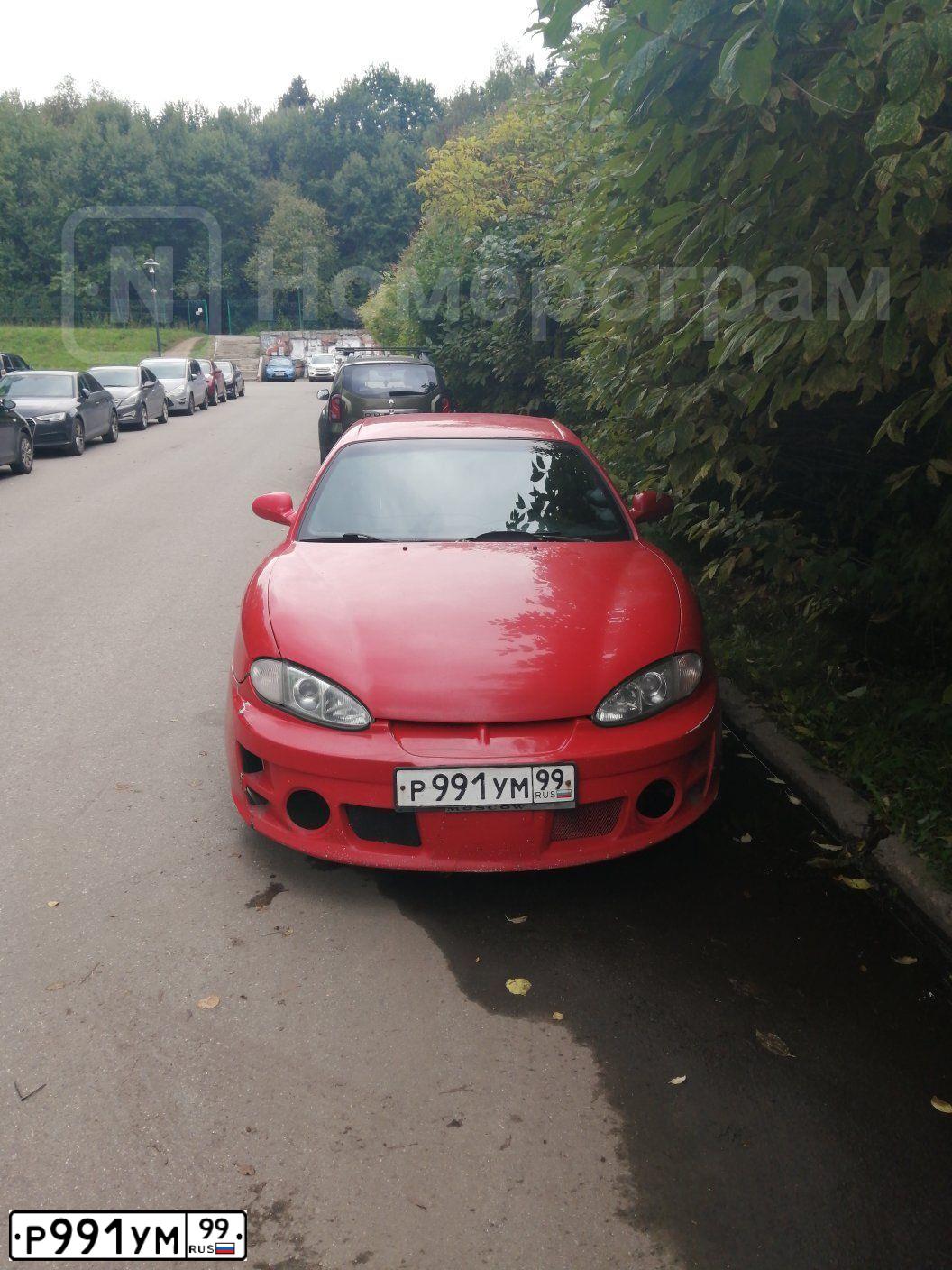 Фото автомобиля HYUNDAI TIBURON, 1998 — госномер Р991УМ99. Цвет: Красный
