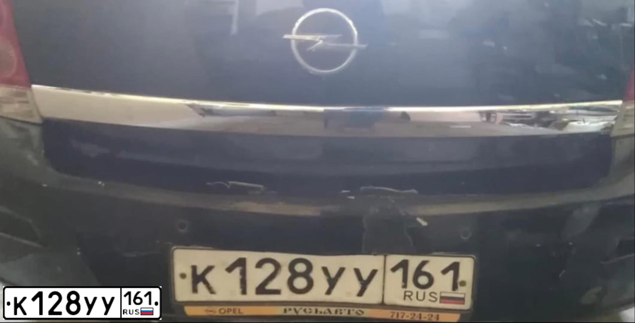 Фото автомобиля OPEL ASTRA, 2010 — госномер К128УУ161. Цвет: ЧЕРНЫЙ