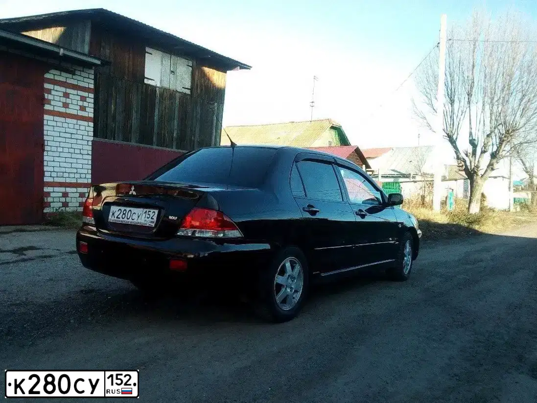 Фото автомобиля MITSUBISHI LANCER, 2007 — госномер Т343РТ52. Цвет: ЧЕРНЫЙ