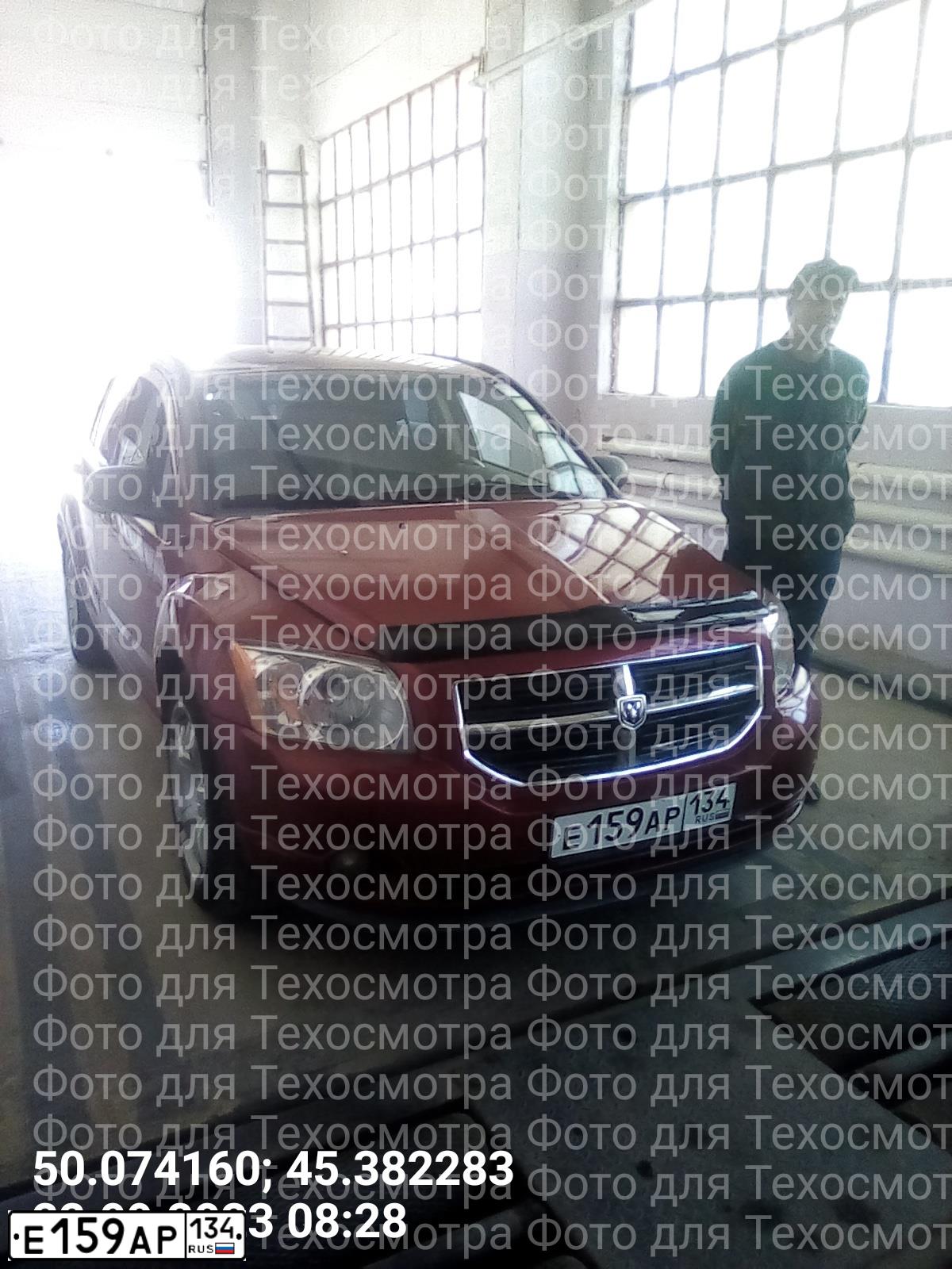 Фото автомобиля DODGE CALIBER, 2007 — госномер Е159АР134. Цвет: ВИШНЕВЫЙ
