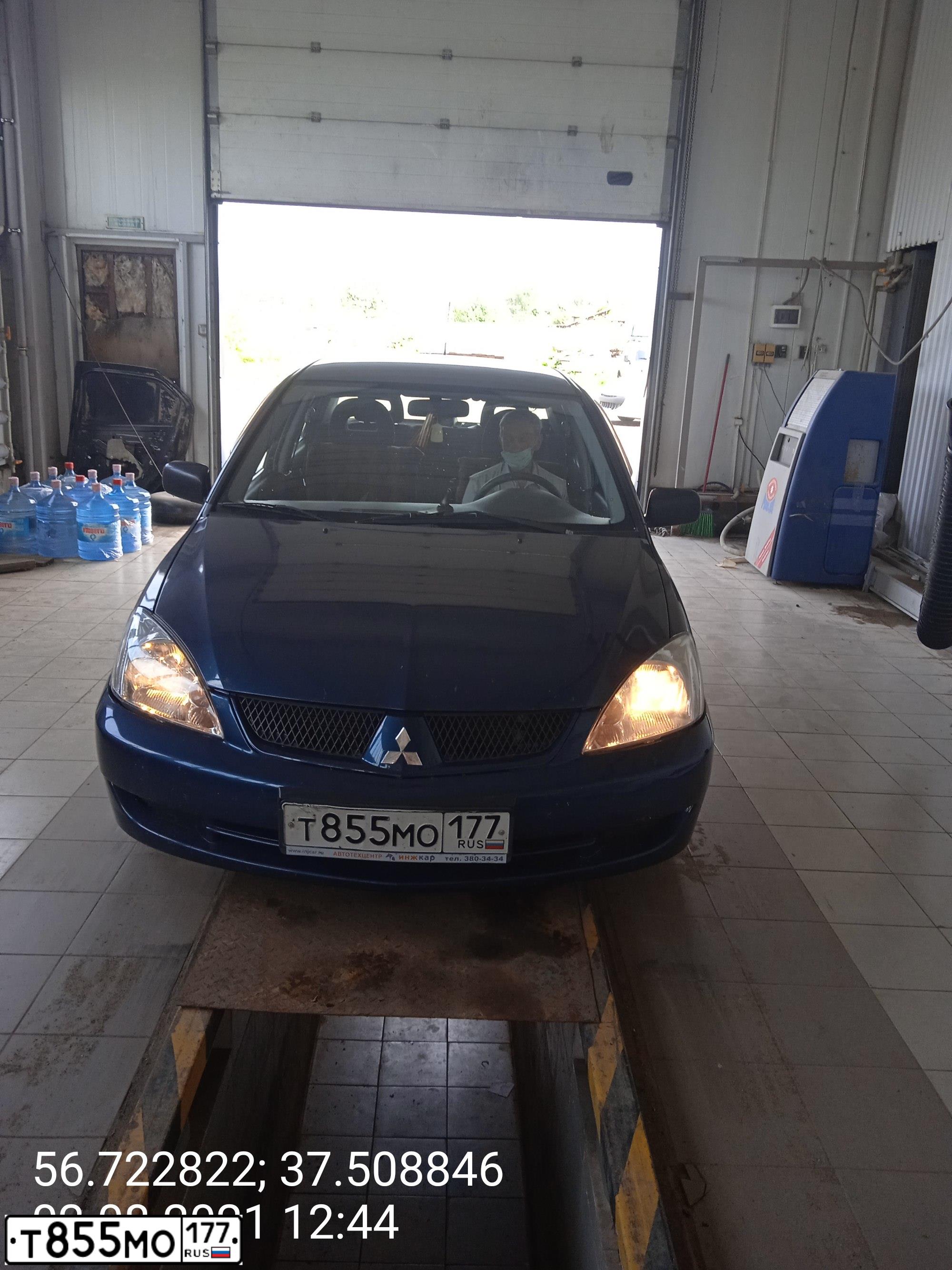 Фото автомобиля MITSUBISHI LANCER, 2006 — госномер Т855МО177. Цвет: синий