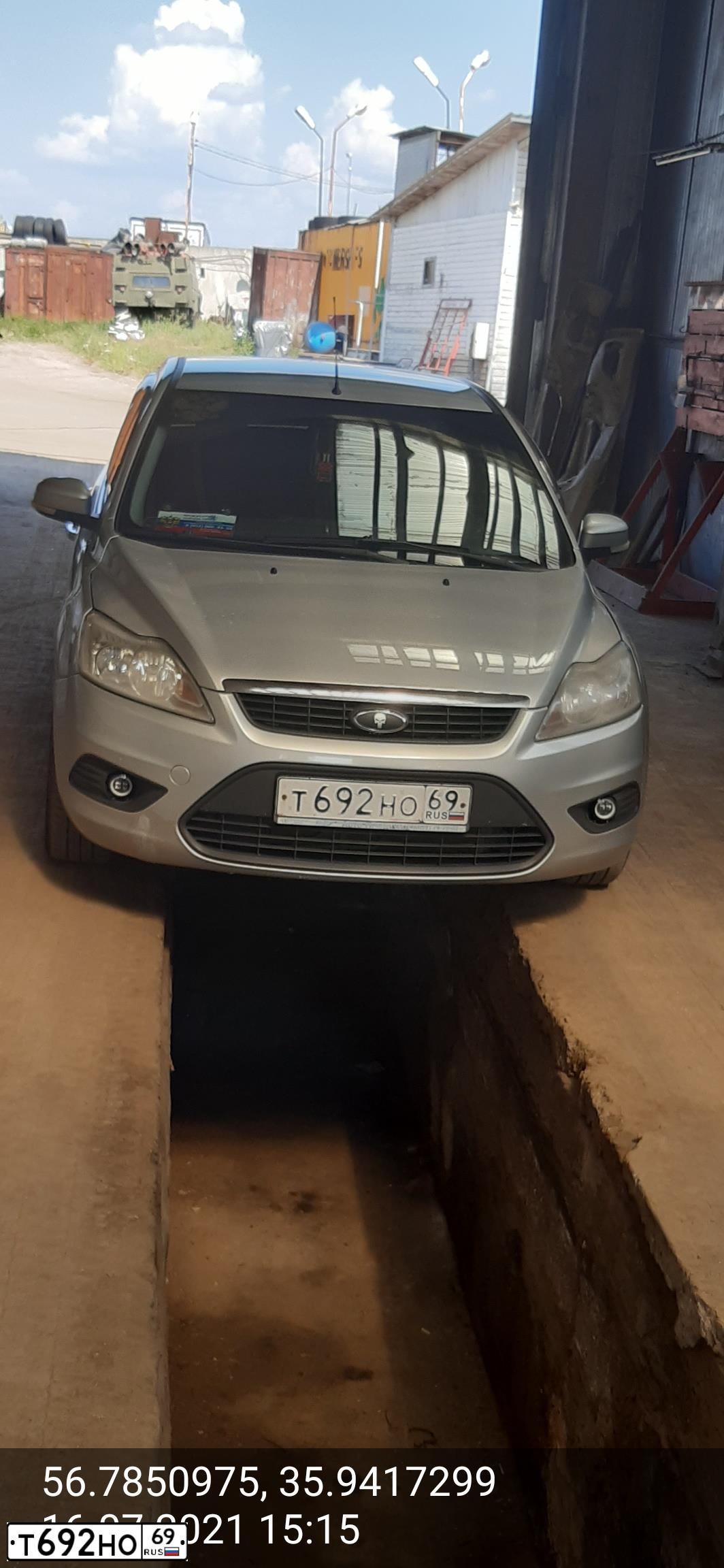 Фото автомобиля FORD FOCUS, 2009 — госномер Т692НО69. Цвет: Серебристый
