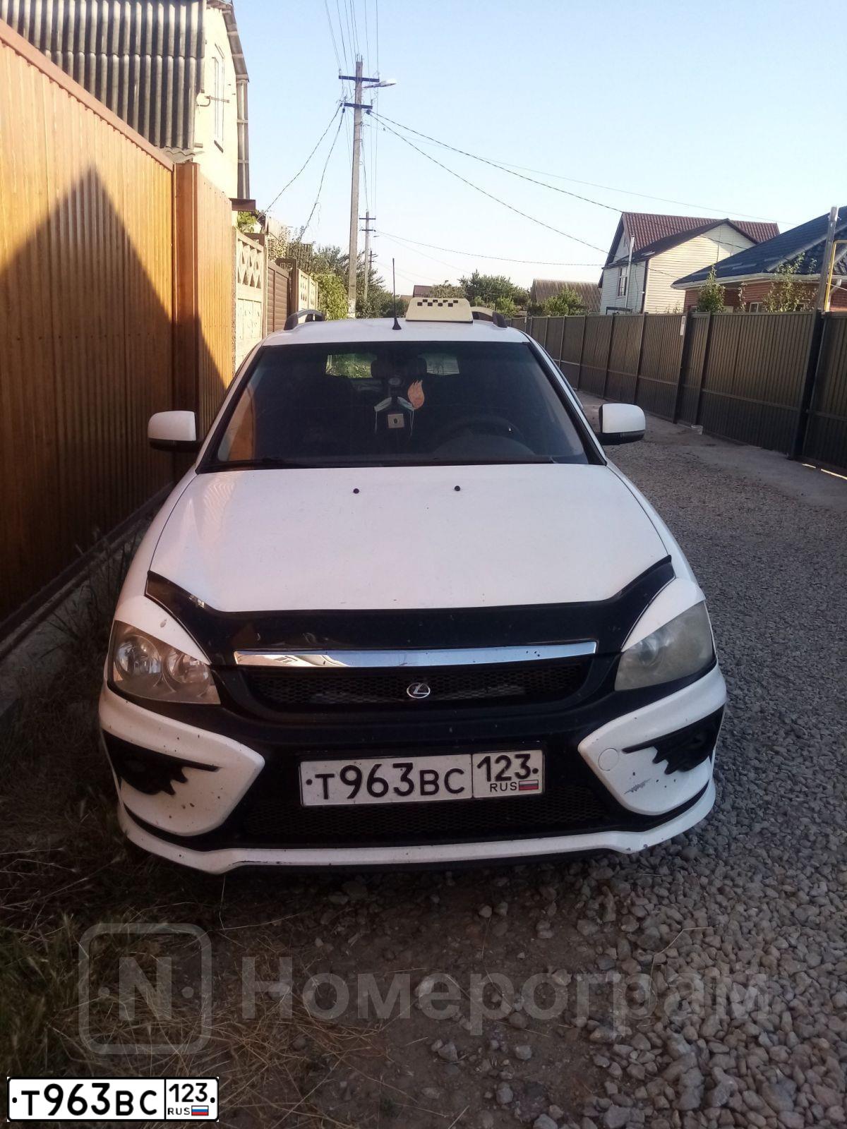 Фото автомобиля LADA 2171 PRIORA, 2012 — госномер Т963ВС123. Цвет: БЕЛЫЙ