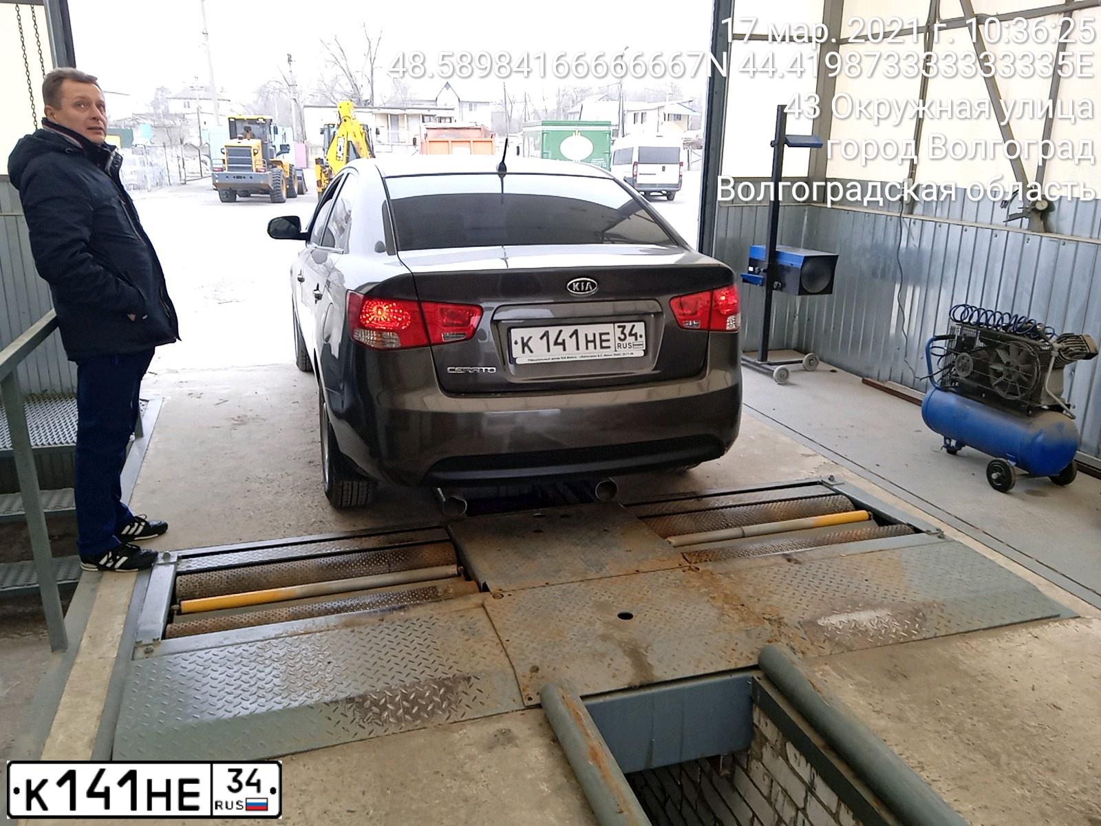 Фото автомобиля LADA 2115 SAMARA, 2007 — госномер К141НЕ34. Цвет: Серебристо-желто-голубой
