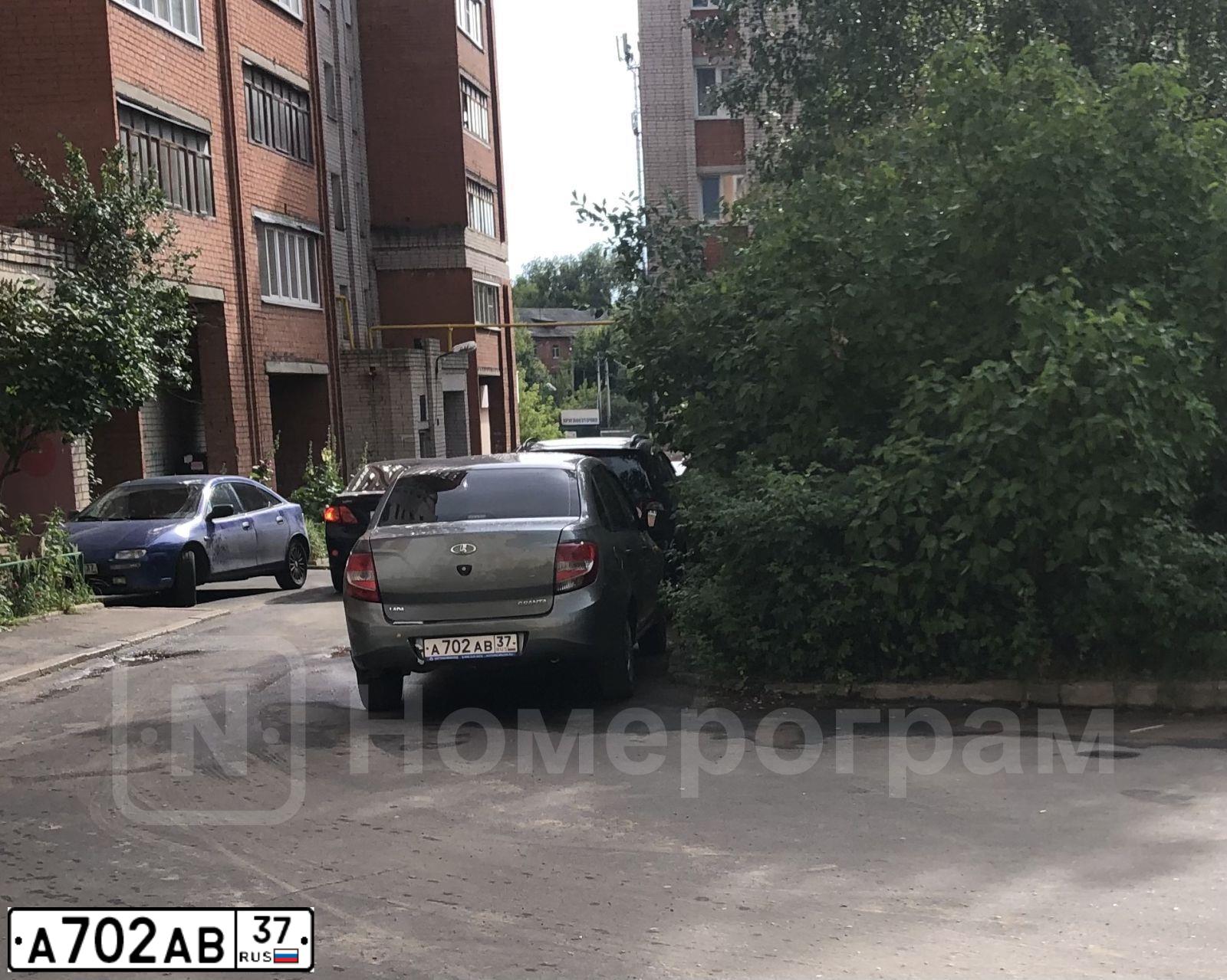 Фото автомобиля LADA 2190 GRANTA, 2012 — госномер А702АВ37. Цвет: ТЕМНО-СЕРЫЙ МЕТАЛЛИК