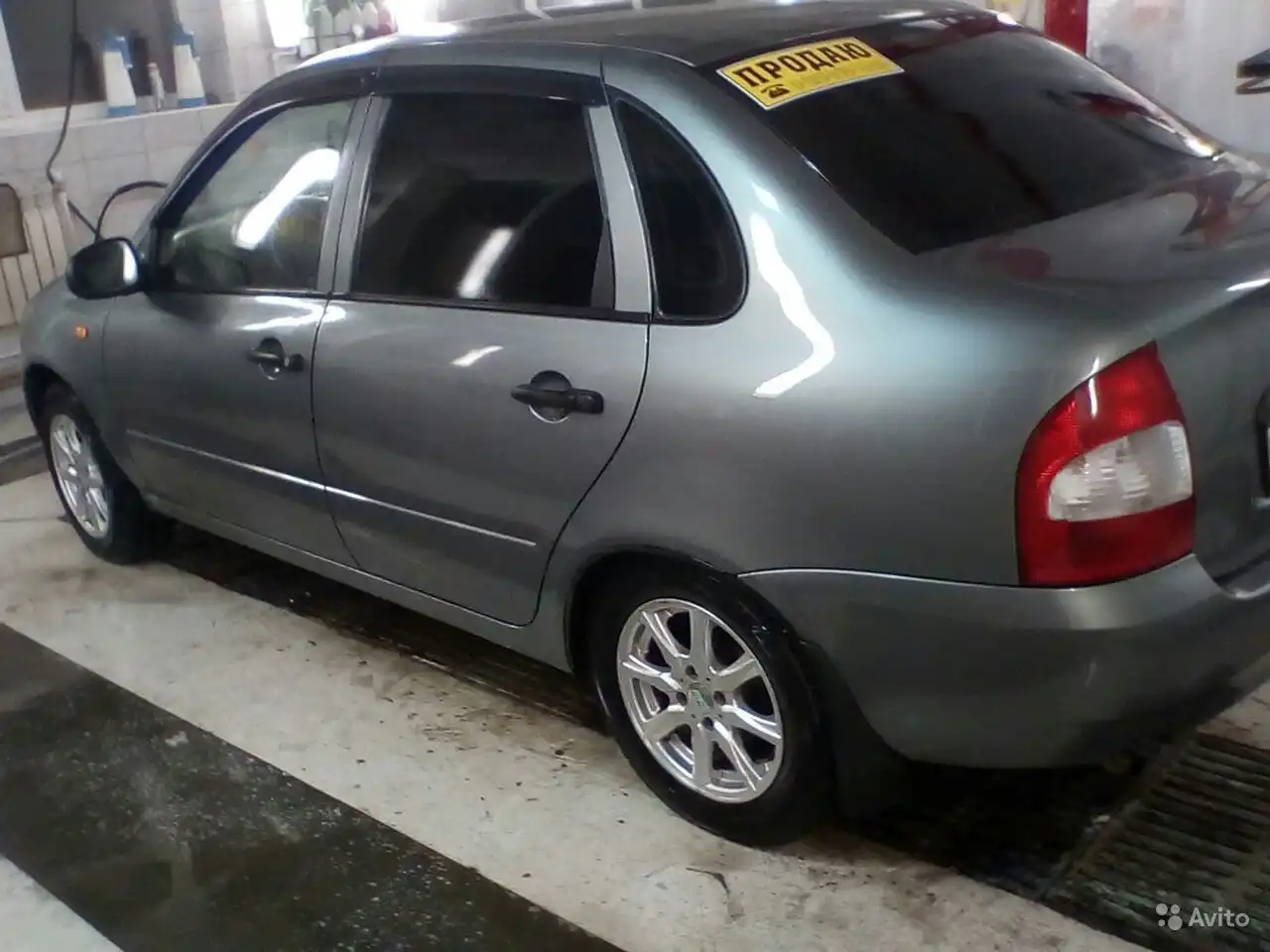 Фото автомобиля LADA 1118 KALINA, 2008 — госномер Е289ОН15. Цвет: Темно-серый металлик