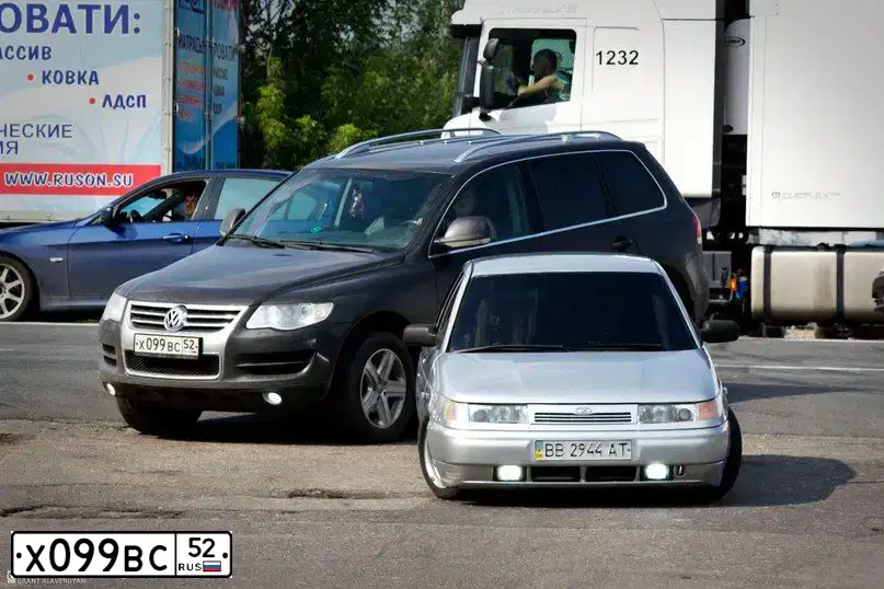 Фото автомобиля AUDI Q7, 2011 — госномер М001СХ37. Цвет: Темно-синий
