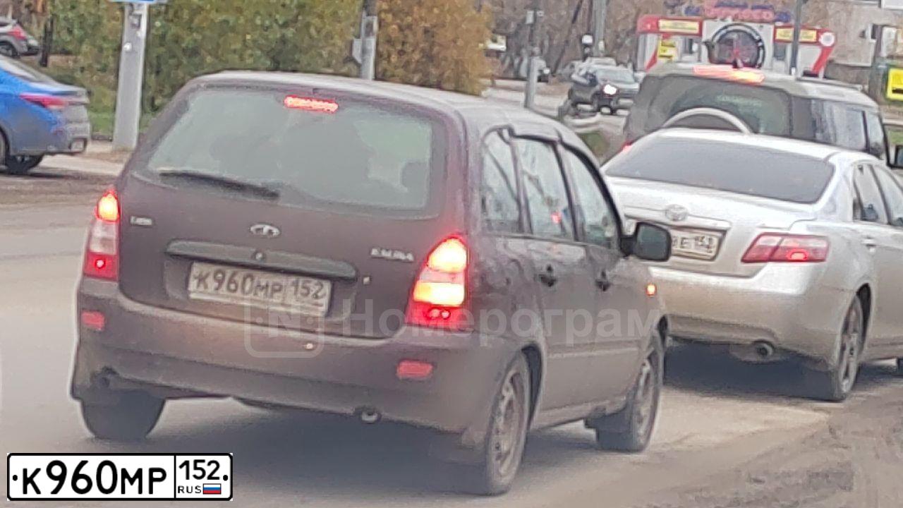 Фото автомобиля LADA 1117 KALINA, 2012 — госномер К960МР152. Цвет: ТЕМНО-ВИШНЕВЫЙ
