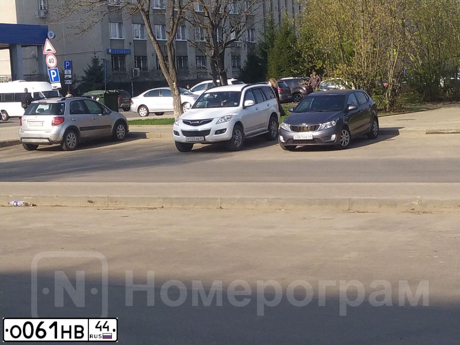 Фото автомобиля KIA RIO, 2014 — госномер О061НВ44. Цвет: ТЕМНО-СЕРЫЙ