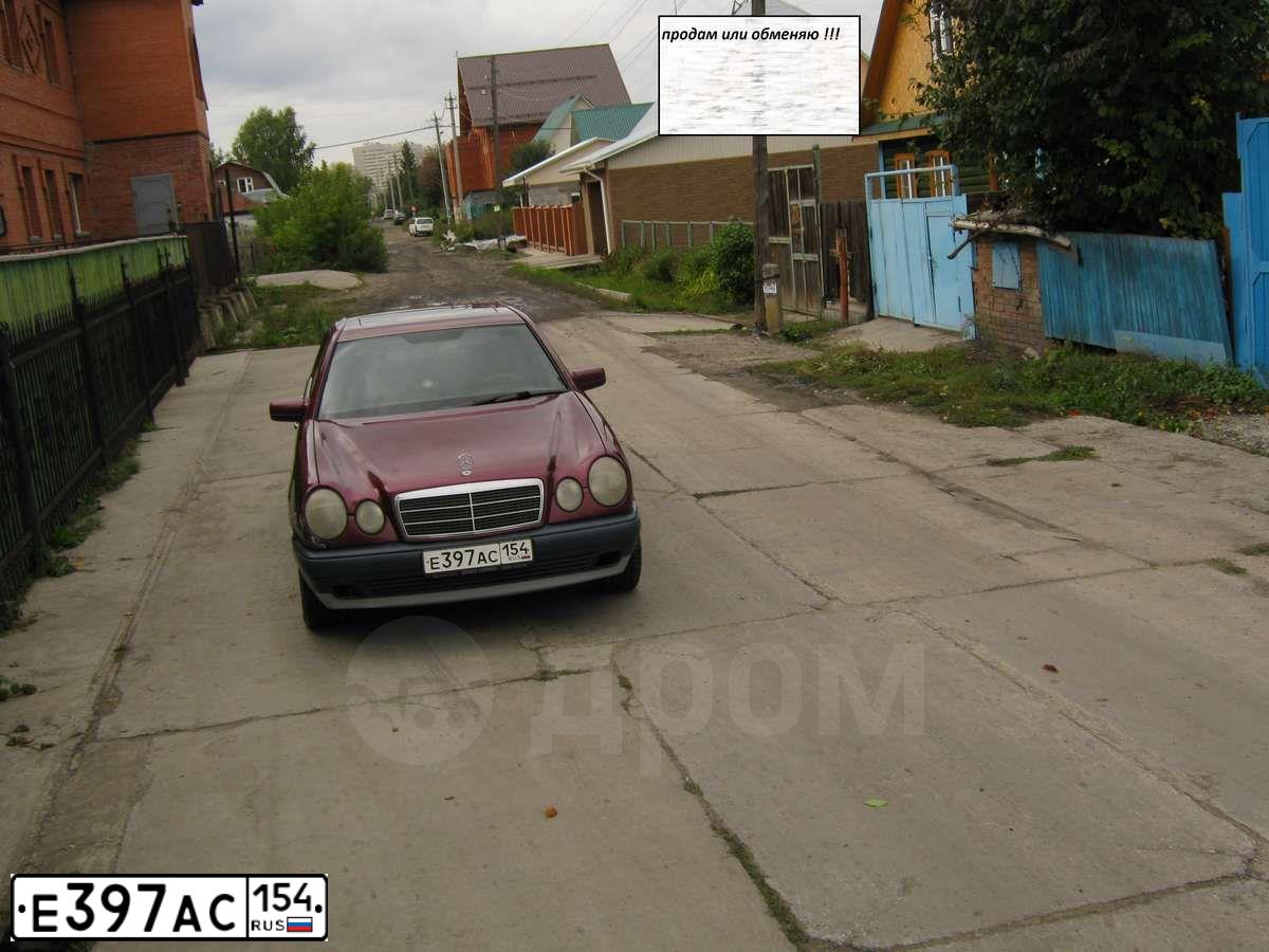 Фото автомобиля MERCEDES E-KLASSE, 1996 — госномер Е397АС154. Цвет: БОРДОВЫЙ