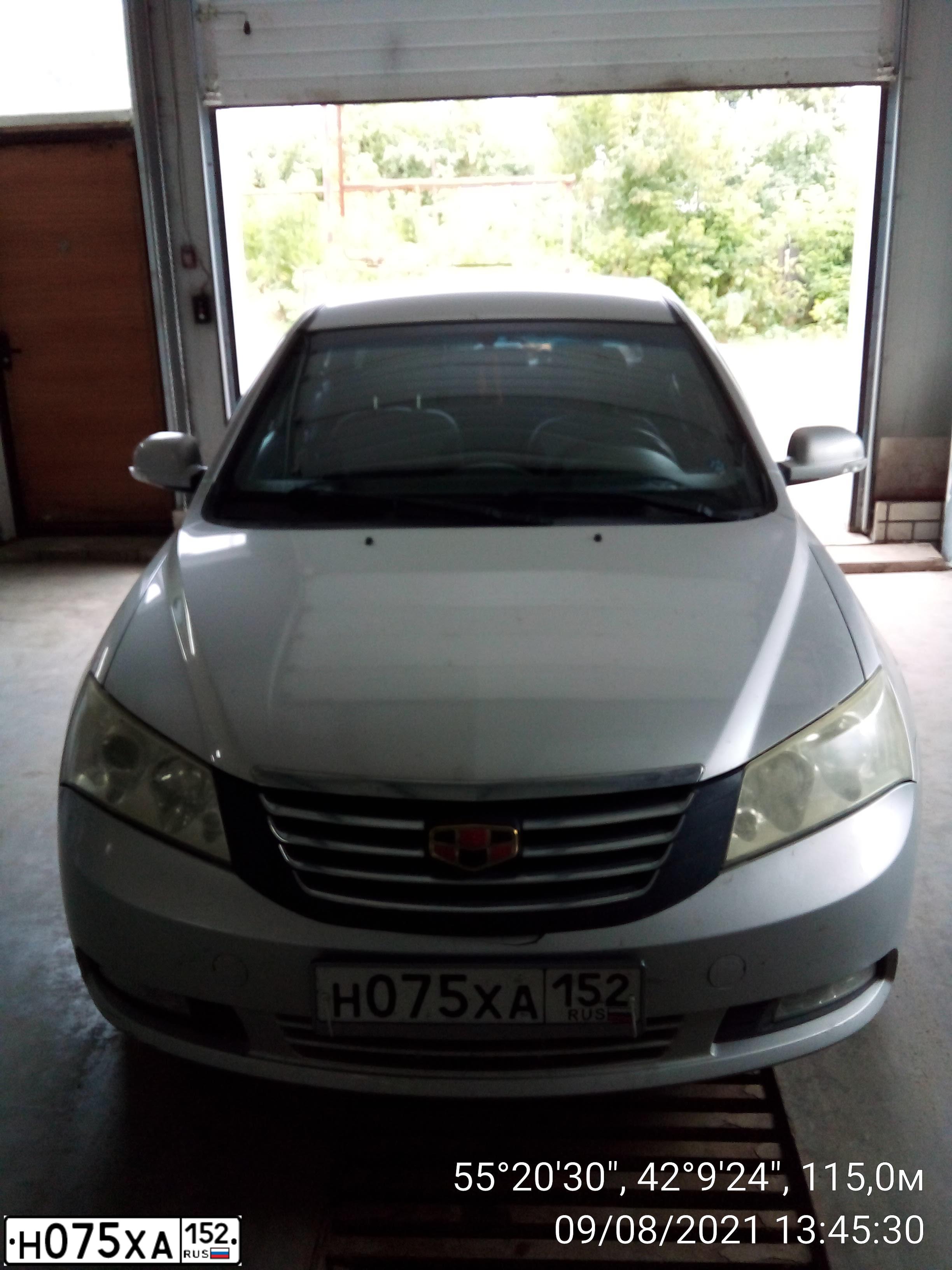 Фото автомобиля GEELY EMGRAND, 2014 — госномер Н075ХА152. Цвет: СВЕТЛО - СЕРЫЙ