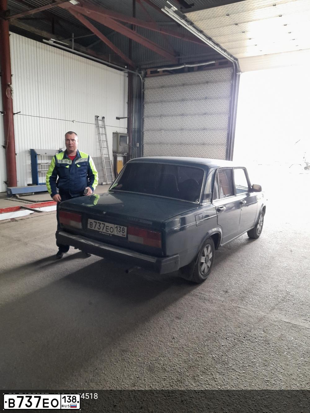 Фото автомобиля LADA 2107, 2006 — госномер Е053НЕ138. Цвет: СИНЕ-ЗЕЛЕНЫЙ