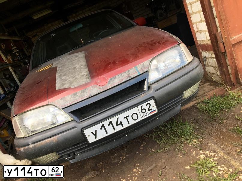 Фото автомобиля OPEL OMEGA, 1989 — госномер Н023СТ790. Цвет: КРАСНЫЙ