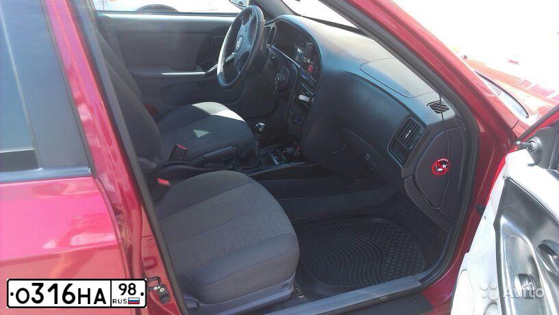 Фото автомобиля HYUNDAI ELANTRA, 2005 — госномер Н554МС82. Цвет: ВИШНЕВЫЙ