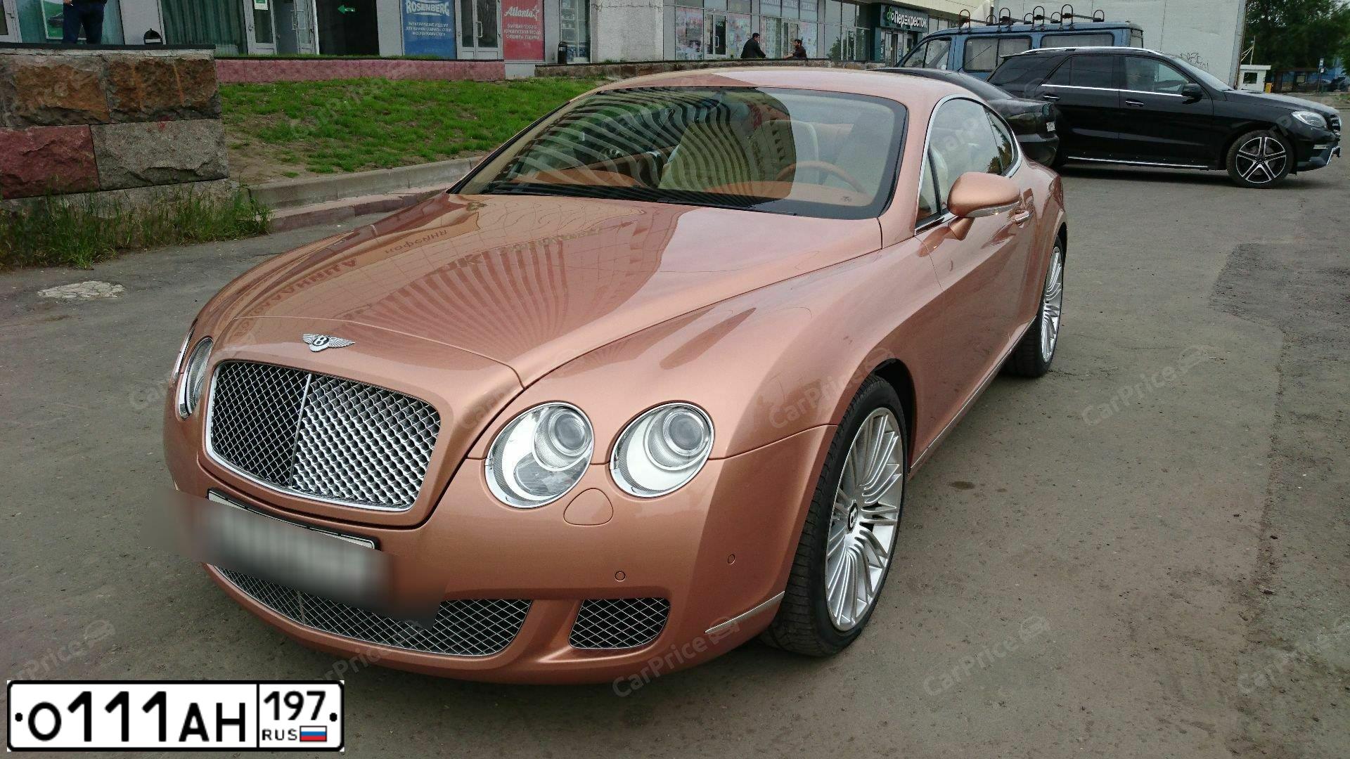 Фото автомобиля BENTLEY CONTINENTAL, 2008 — госномер О412СА799. Цвет: ОРАНЖЕВЫЙ