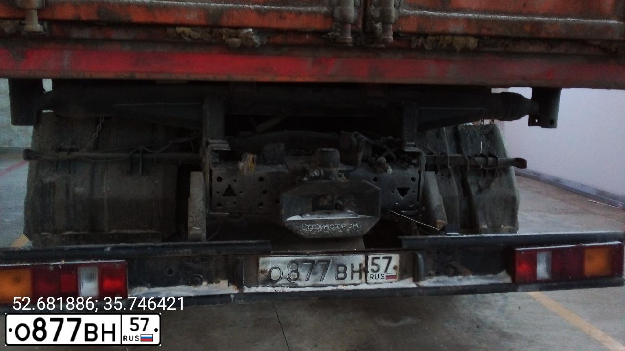 Фото автомобиля KAMAZ 65115 /6X4/, 2015 — госномер О877ВН57. Цвет: ОРАНЖЕВЫЙ