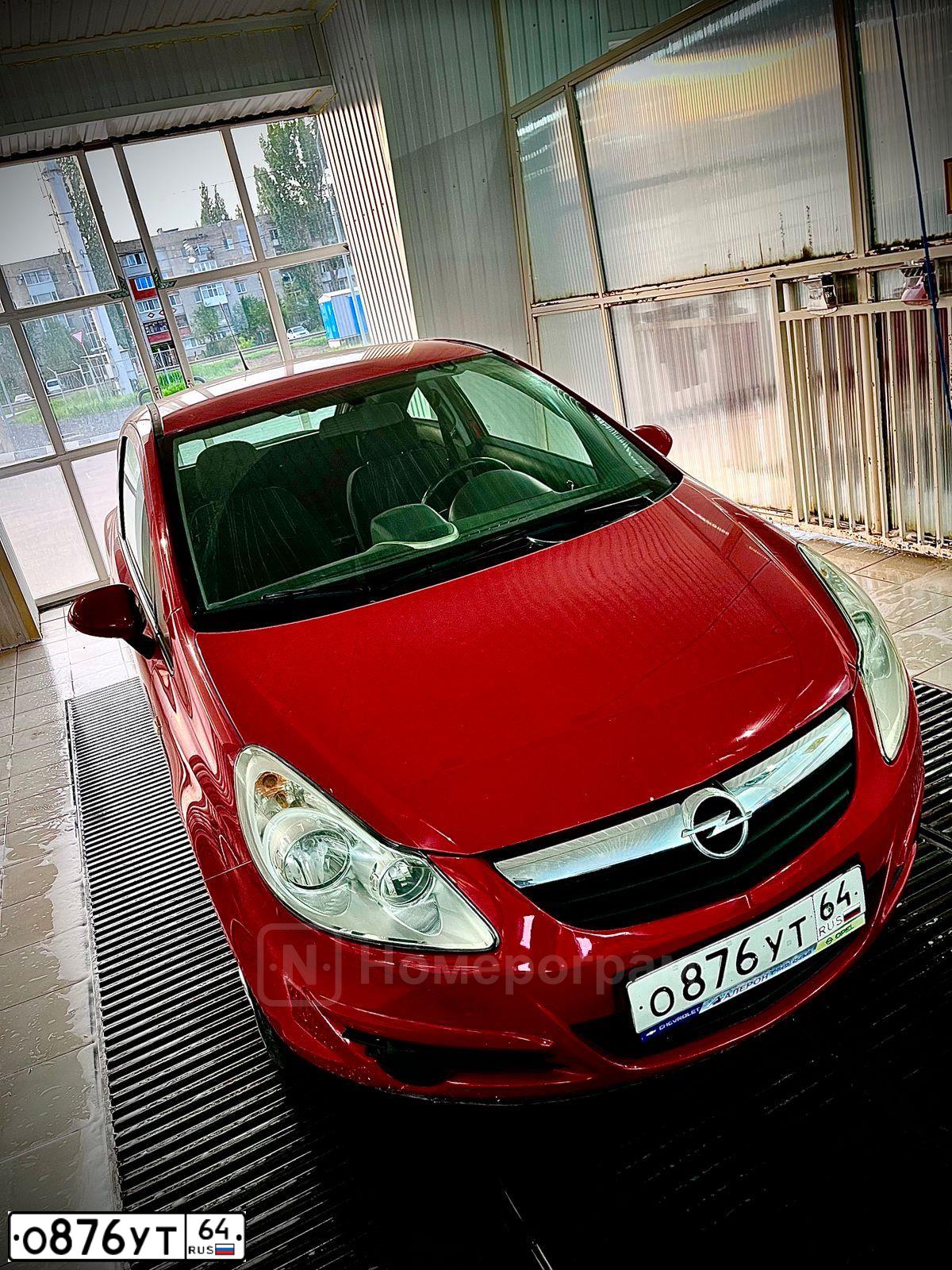 Фото автомобиля OPEL CORSA, 2008 — госномер О876УТ64. Цвет: КРАСНЫЙ