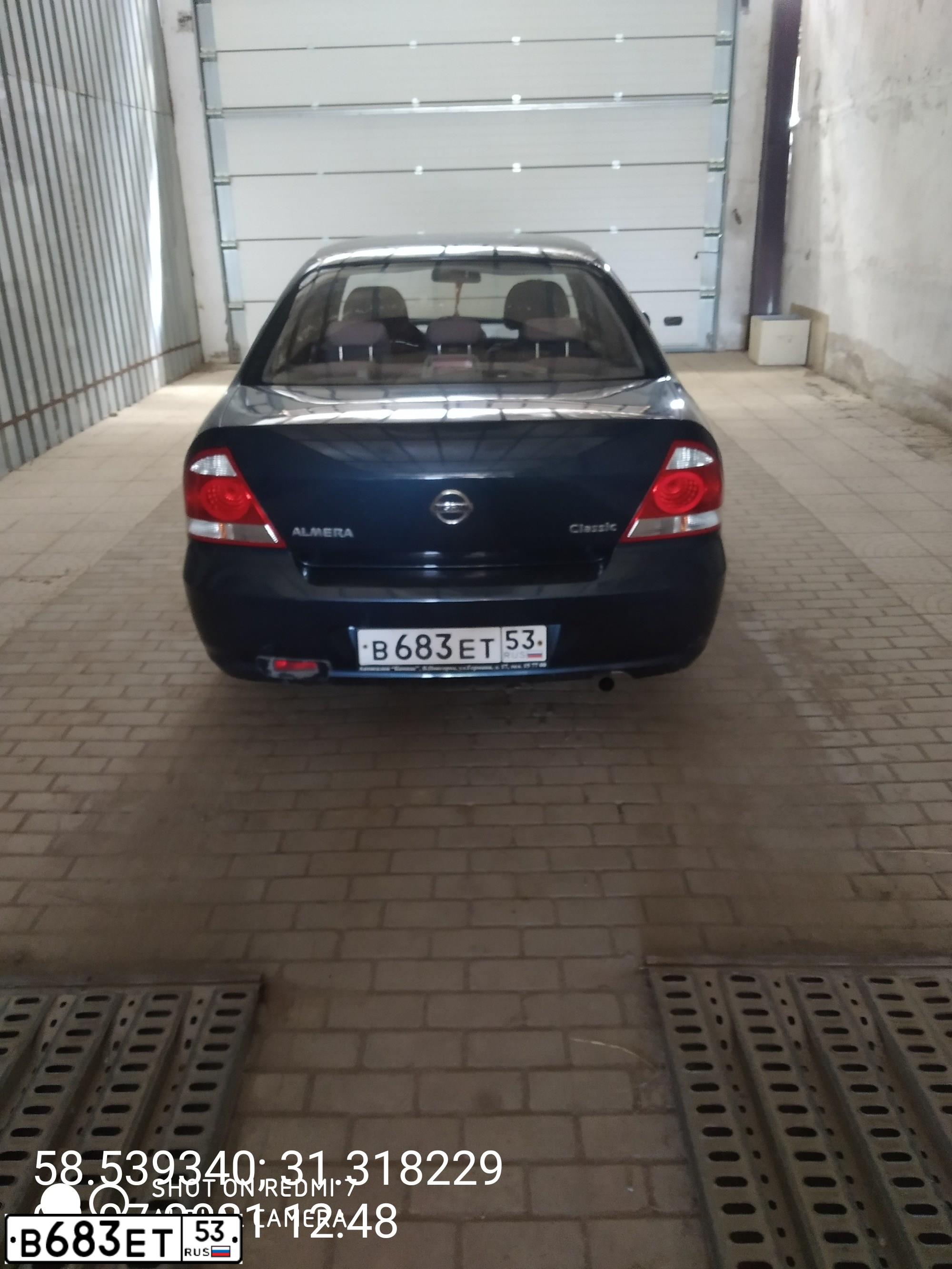 Фото автомобиля NISSAN ALMERA, 2007 — госномер К043ОУ53. Цвет: Темно-синий