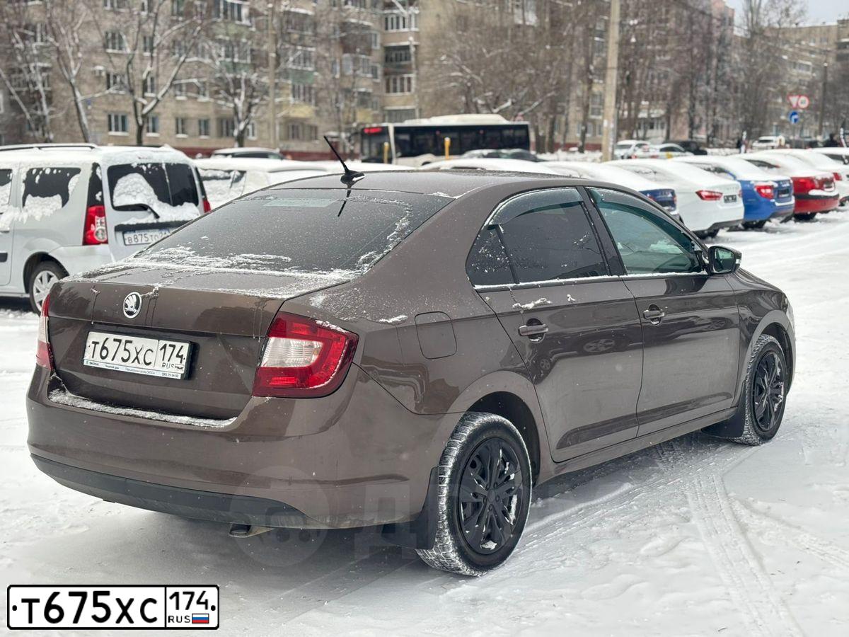 Фото автомобиля SKODA RAPID, 2018 — госномер Т675ХС174. Цвет: Коричневый