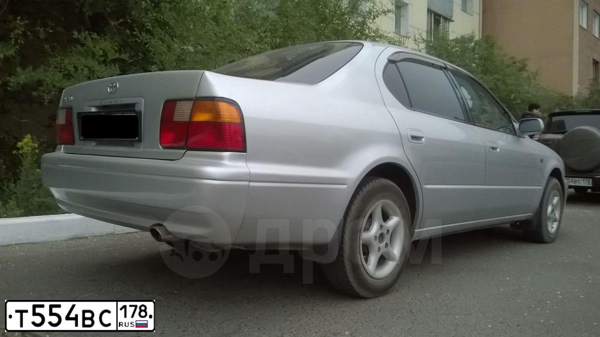 Фото автомобиля VOLKSWAGEN CARAVELLE, 2014 — госномер Т554ВС178. Цвет: СЕРЫЙ