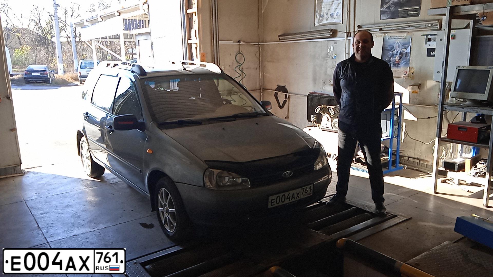 Фото автомобиля LADA 1117 KALINA, 2009 — госномер Е004АХ761. Цвет: ТЕМНО-СЕРЫЙ МЕТАЛЛ