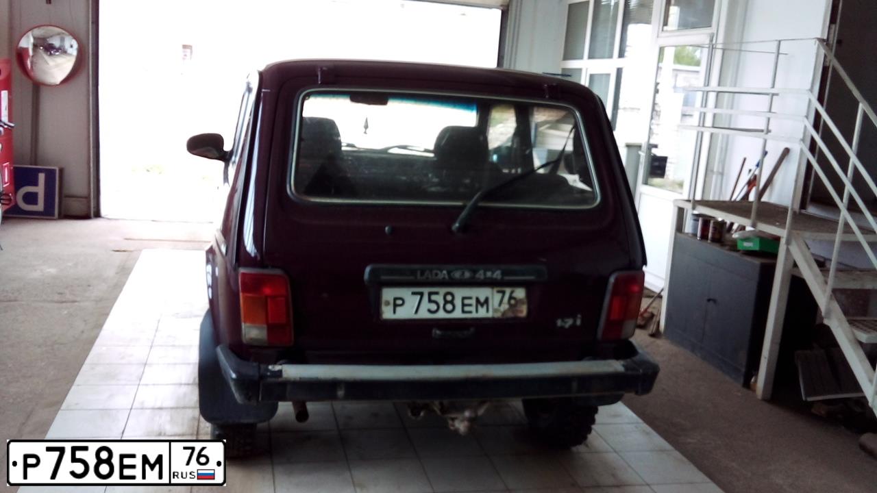 Фото автомобиля LADA 2121 NIVA, 2003 — госномер Х971МР76. Цвет: Красный