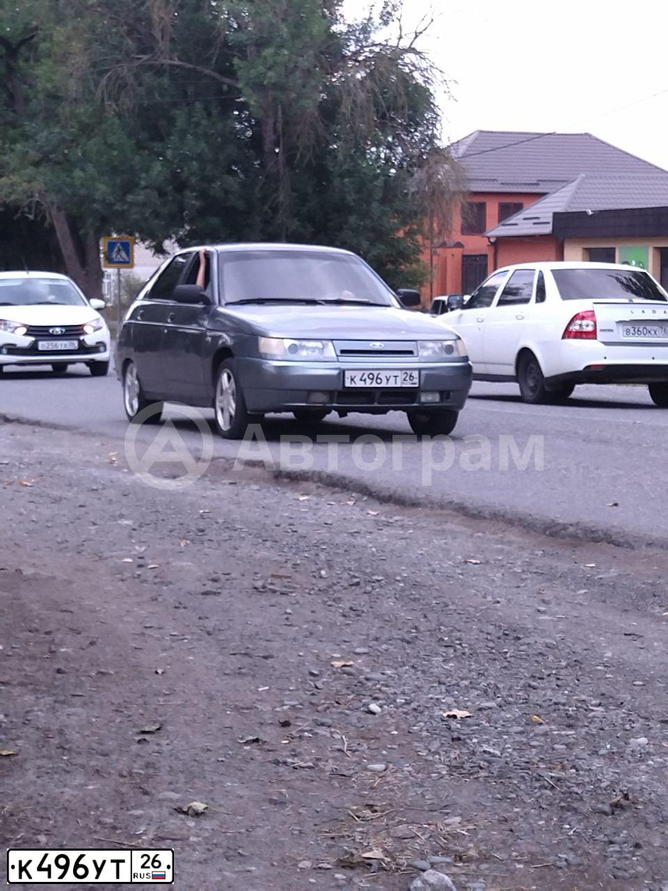 Фото автомобиля LADA 2112, 2005 — госномер М120ЕТ190. Цвет: СРЕДНИЙ СЕРО-ЗЕЛЕНЫЙ