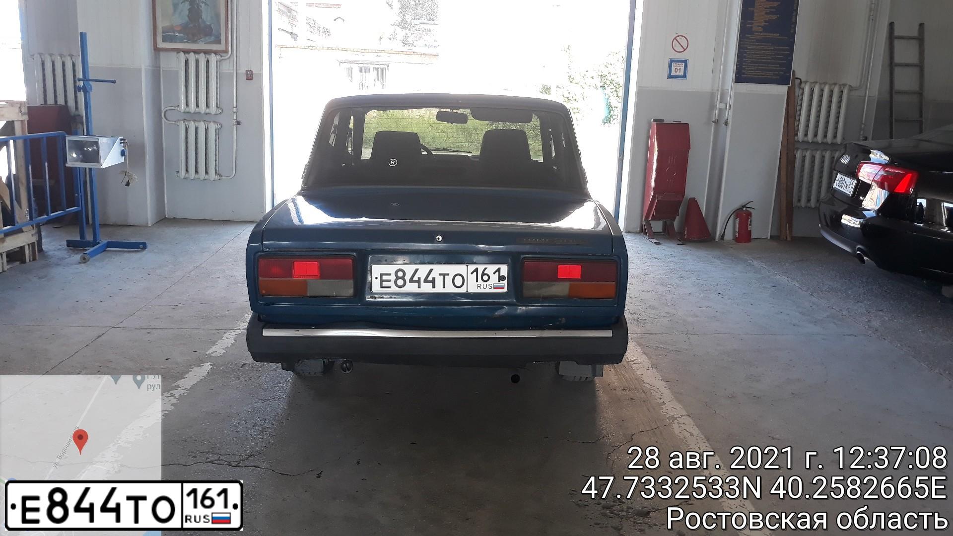 Фото автомобиля LADA 2107, 2005 — госномер Е844ТО161. Цвет: сине-зеленый