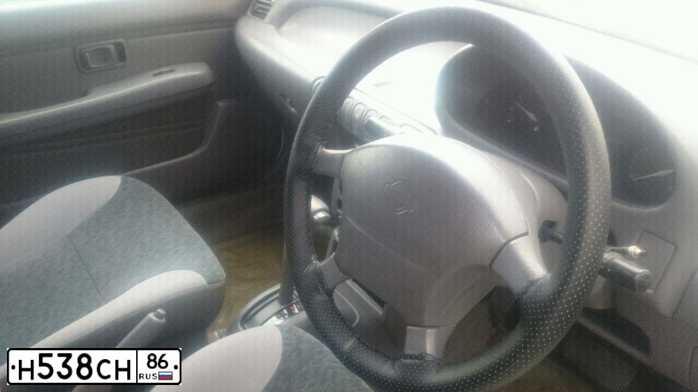 Фото автомобиля NISSAN MARCH, 1997 — госномер Н538СН86