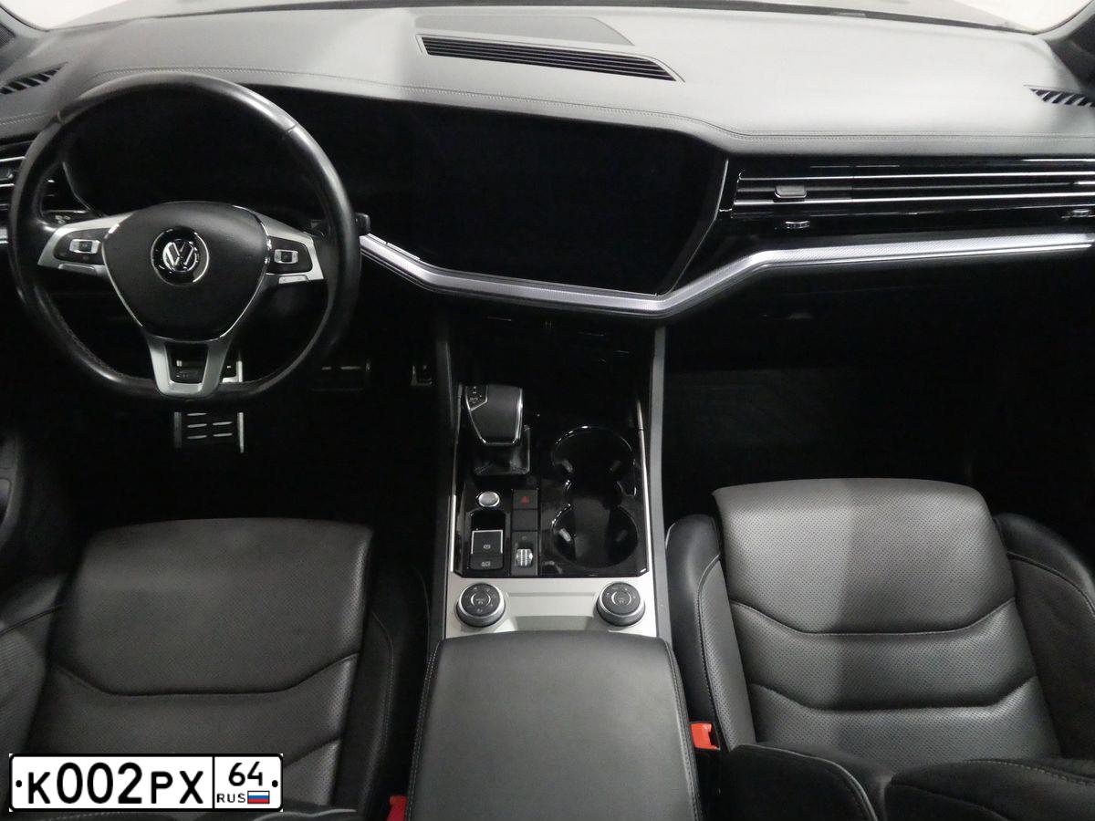Фото автомобиля LADA 2172 PRIORA, 2009 — госномер К002РХ64. Цвет: СИНЕ-ЧЕРНЫЙ