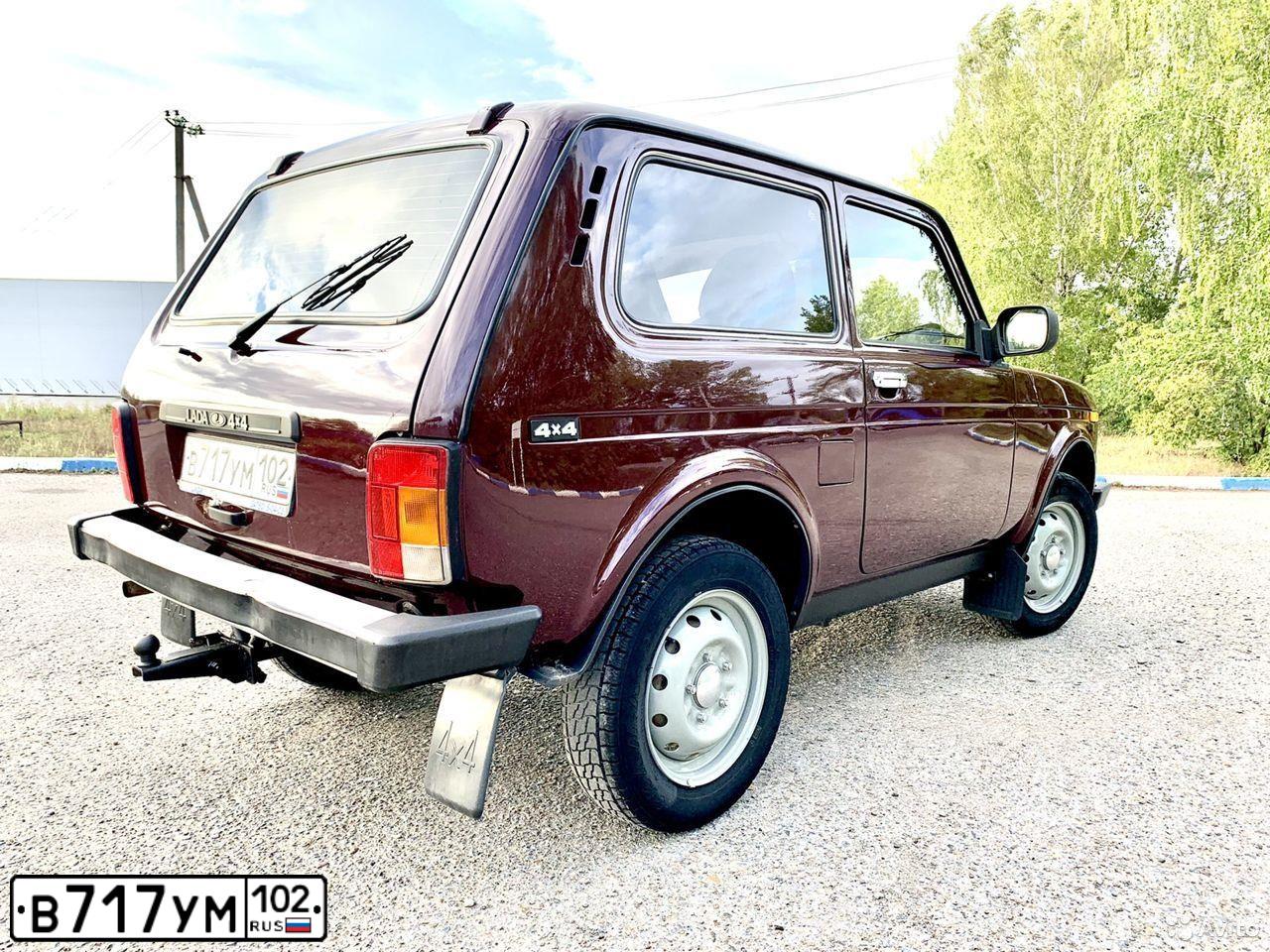 Фото автомобиля LADA 2121 NIVA, 2011 — госномер В717УМ102. Цвет: ТЕМНО-ВИШНЕВЫЙ