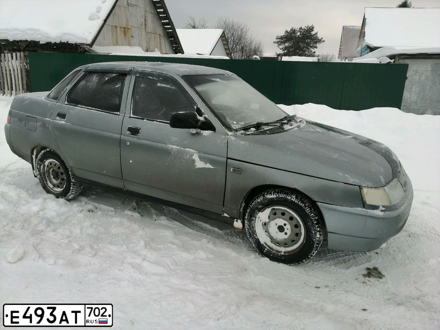 Фото автомобиля LADA 2110 LADA, 2005 — госномер Е493АТ702. Цвет: средний серо-зеленый металлик