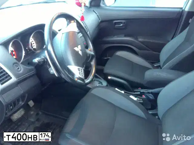 Фото автомобиля MITSUBISHI OUTLANDER, 2010 — госномер Т664СУ174. Цвет: БЕЛЫЙ