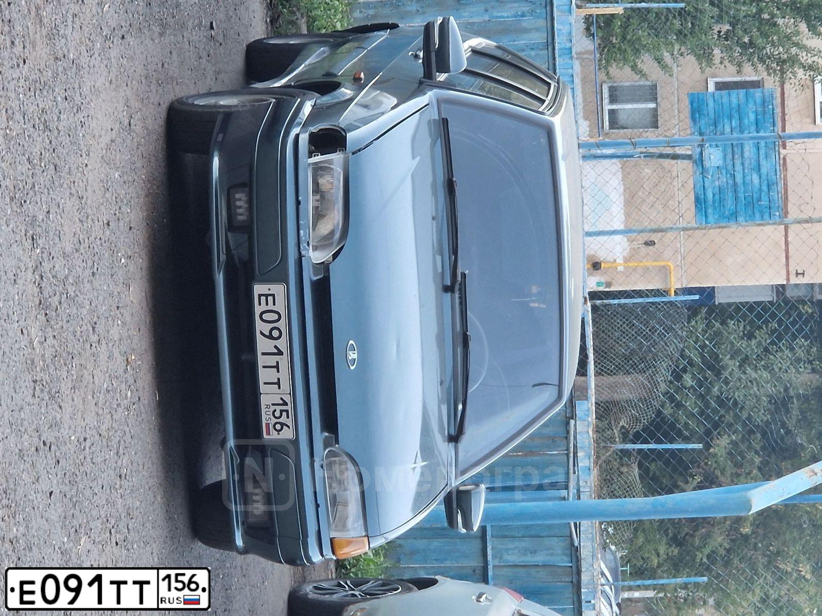 Фото автомобиля LADA 2114 SAMARA, 2010 — госномер Е091ТТ156. Цвет: Серо-сине-зеленый