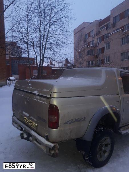 Фото автомобиля KIA SPECTRA, 2007 — госномер Е859УВ82. Цвет: Золотисто-бежевый