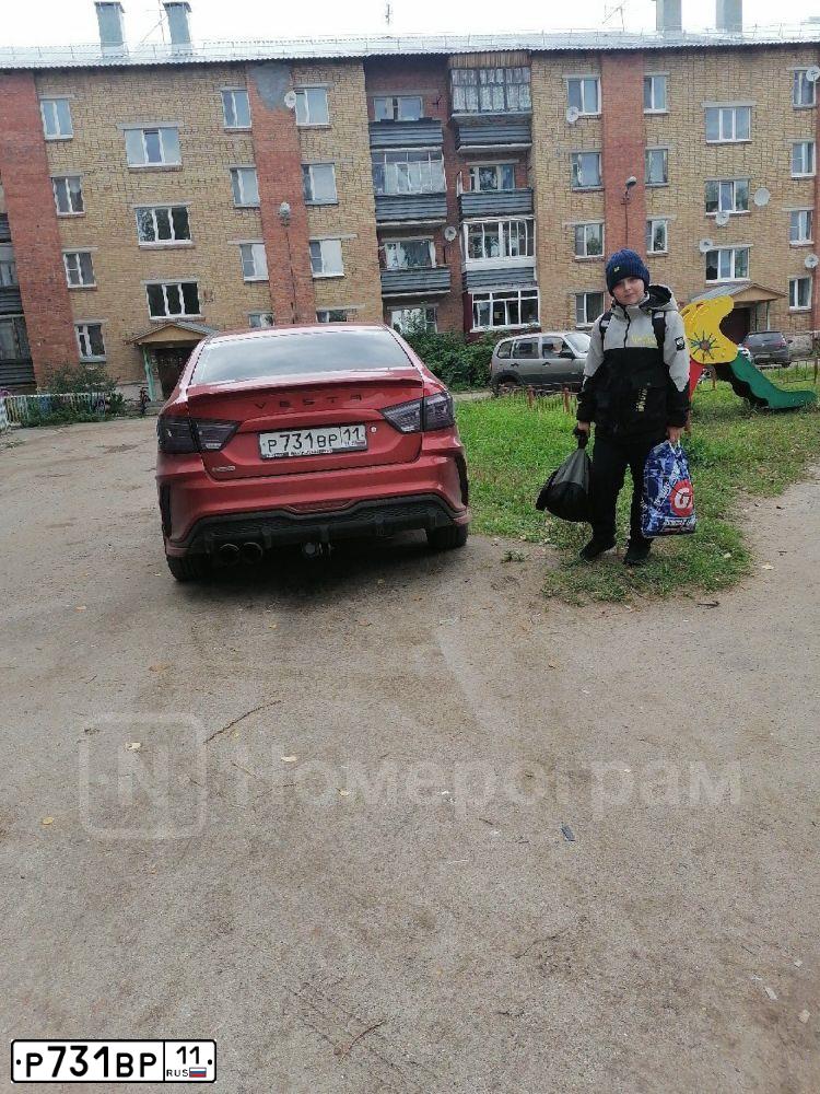 Фото автомобиля LADA VESTA, 2017 — госномер Р731ВР11. Цвет: КРАСНЫЙ
