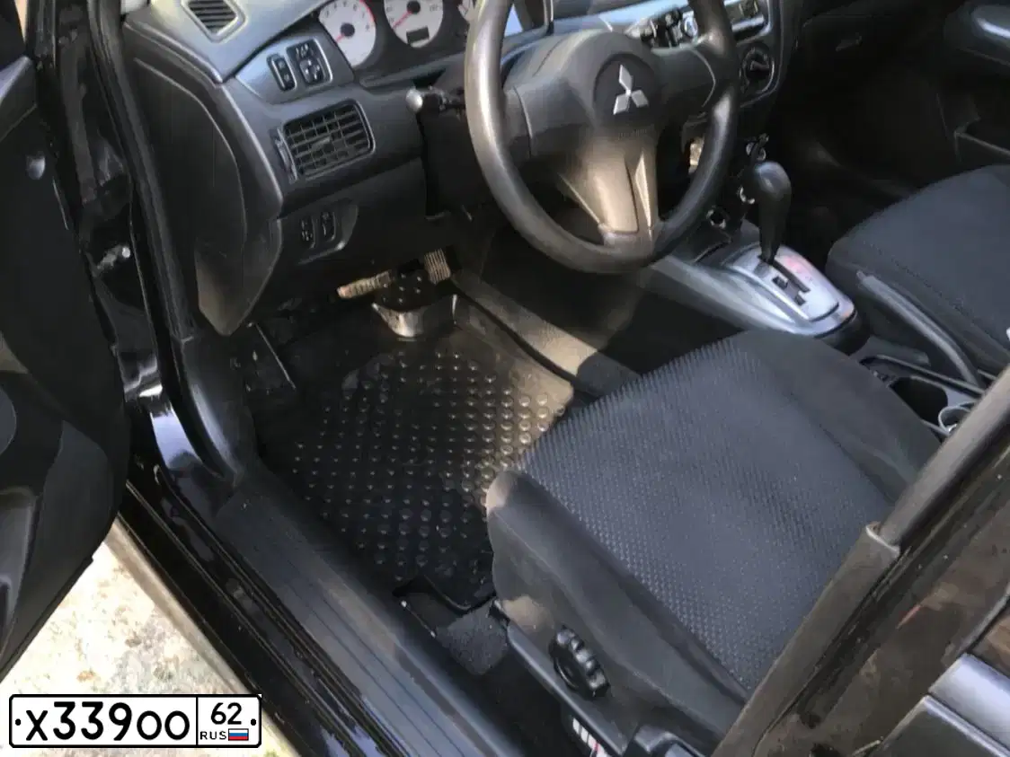 Фото автомобиля MITSUBISHI LANCER, 2007 — госномер Х339ОО62. Цвет: ЧЕРНЫЙ