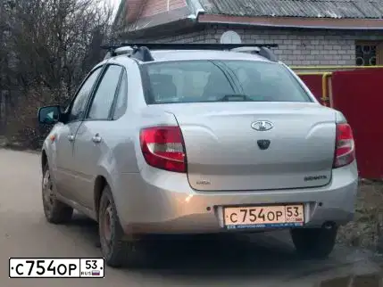 Фото автомобиля LADA 2190 GRANTA, 2012 — госномер С754ОР53. Цвет: СЕРЕБРИСТЫЙ