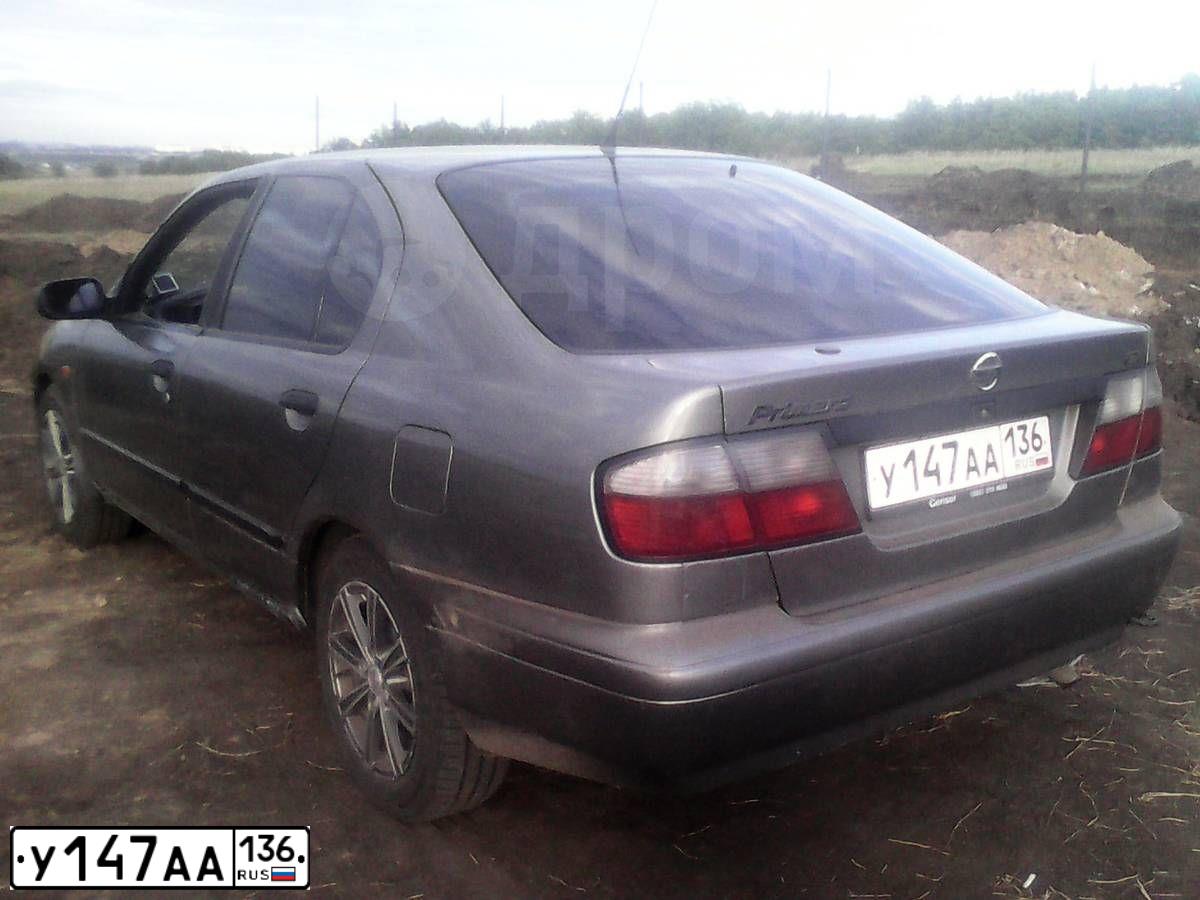 Фото автомобиля NISSAN PRIMERA, 1998 — госномер У147АА136. Цвет: СЕРЫЙ
