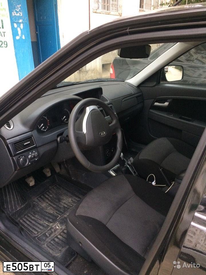 Фото автомобиля LADA 2170 PRIORA, 2016 — госномер Е505ВТ05. Цвет: Белый