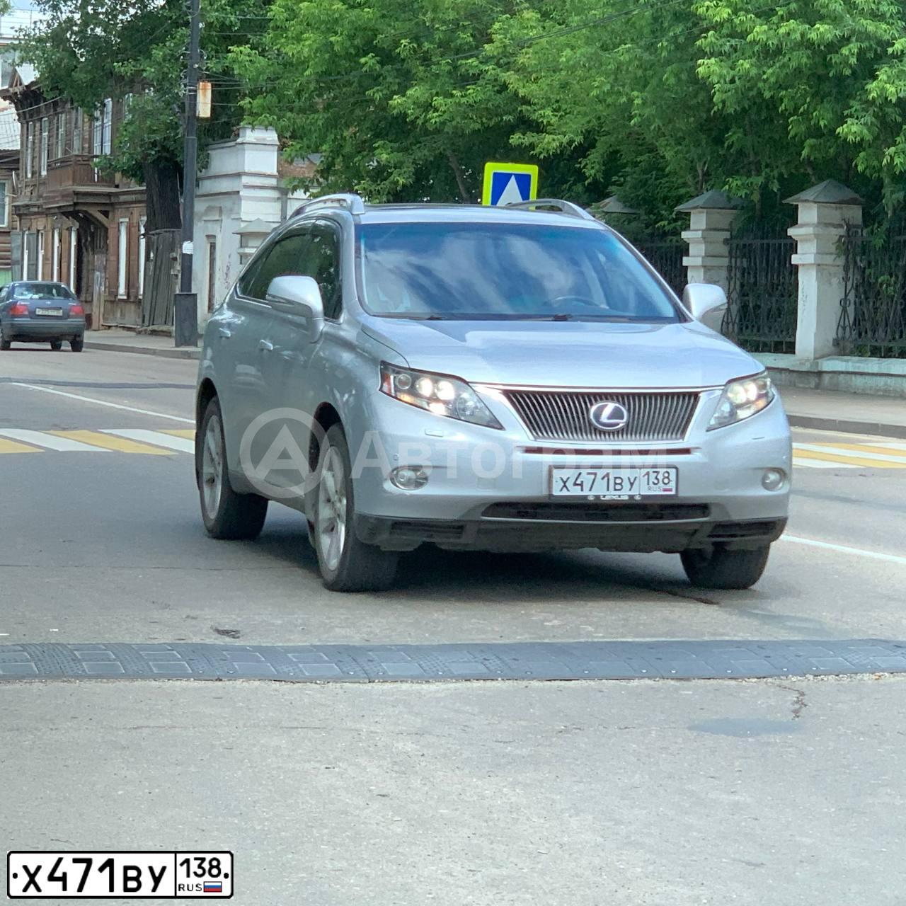 Фото автомобиля LEXUS RX, 2009 — госномер Н541УМ154. Цвет: Серебристый