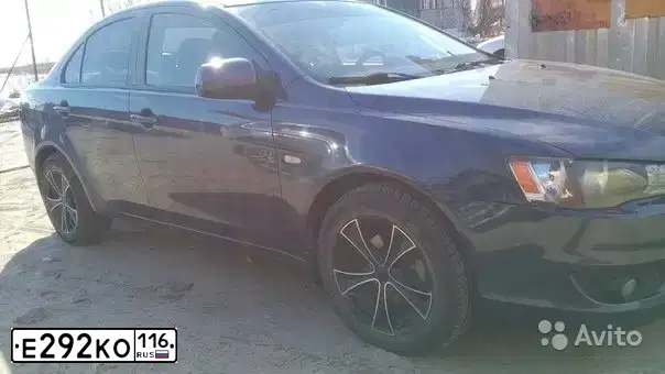 Фото автомобиля MITSUBISHI LANCER, 2007 — госномер А401ОХ702. Цвет: СИНИЙ