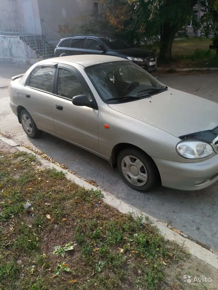 Фото автомобиля CHEVROLET LANOS, 2009 — госномер М058ОВ136. Цвет: СЕРЕБРИСТЫЙ