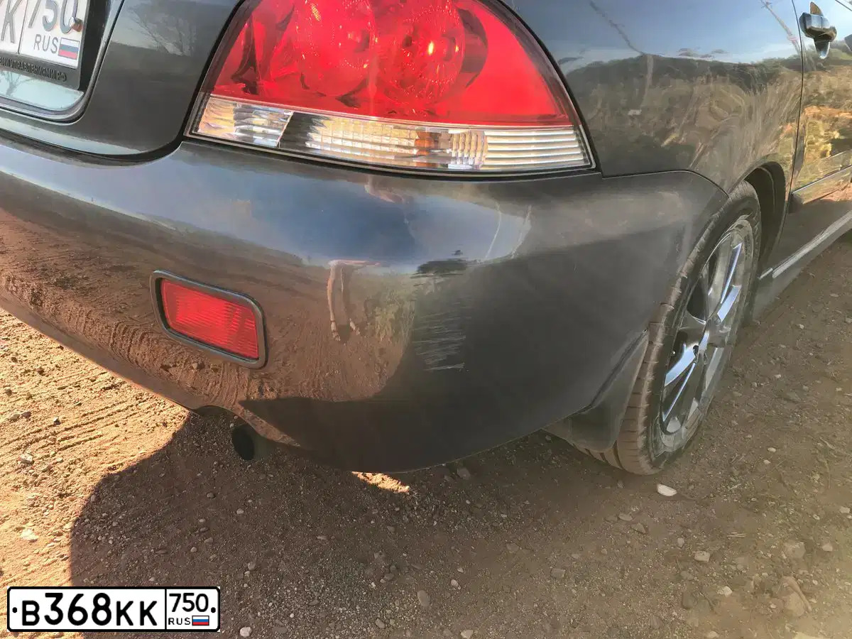Фото автомобиля MITSUBISHI LANCER, 2006 — госномер Т632ОМ190. Цвет: СЕРЫЙ