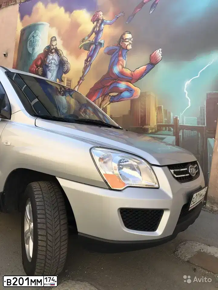 Фото автомобиля KIA SPORTAGE, 2009 — госномер В201ММ174. Цвет: ПЕРЛАМ-СЕРЕБРИСТЫЙ