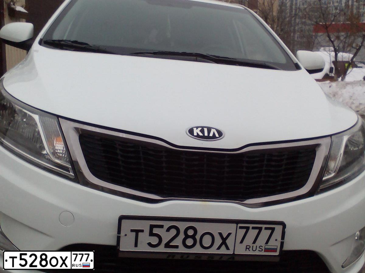 Фото автомобиля KIA RIO, 2014 — госномер А935КК761. Цвет: Белый