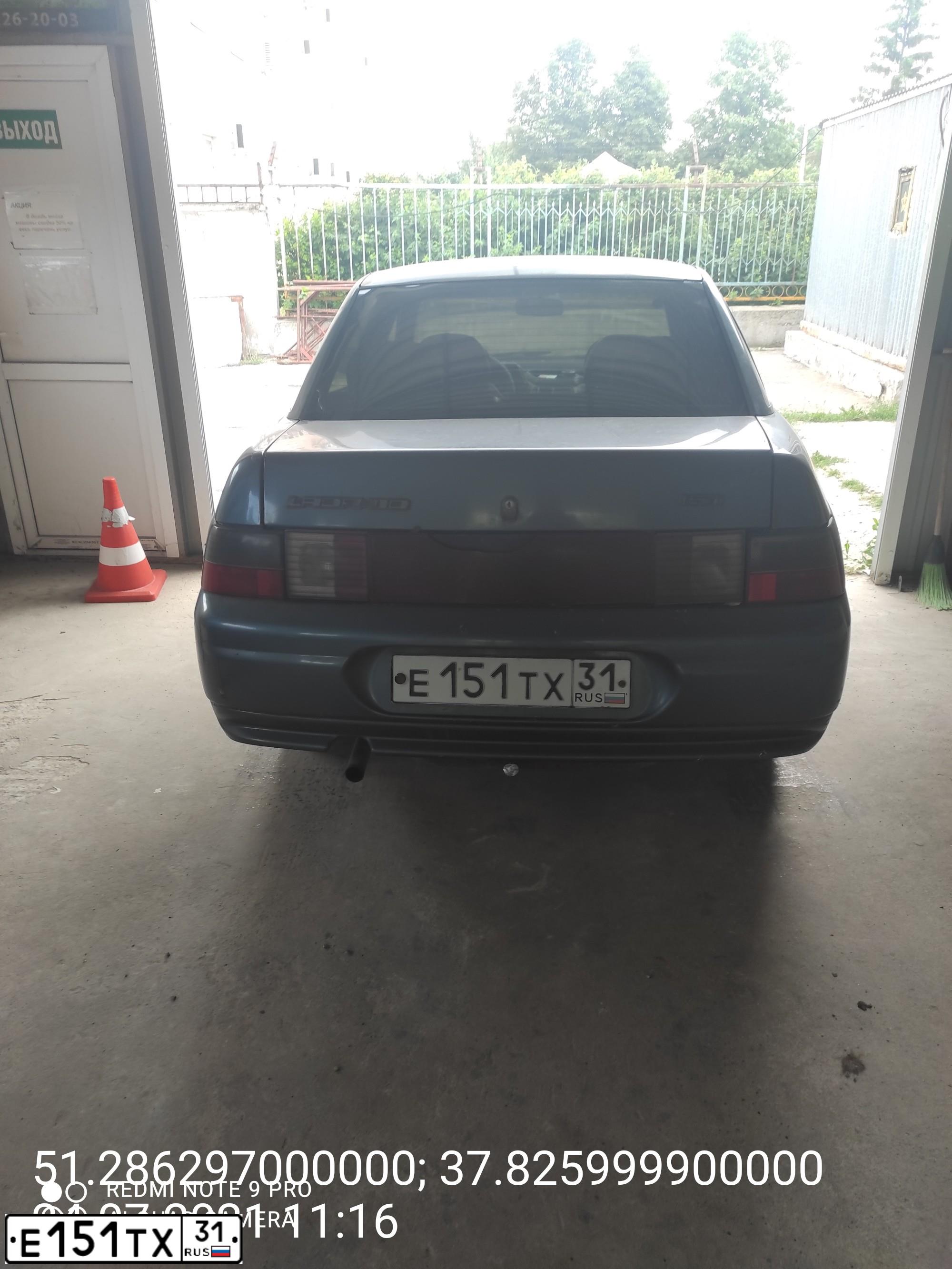 Фото автомобиля LADA 2110, 2001 — госномер Е151ТХ31. Цвет: Темно-серо-синий металик