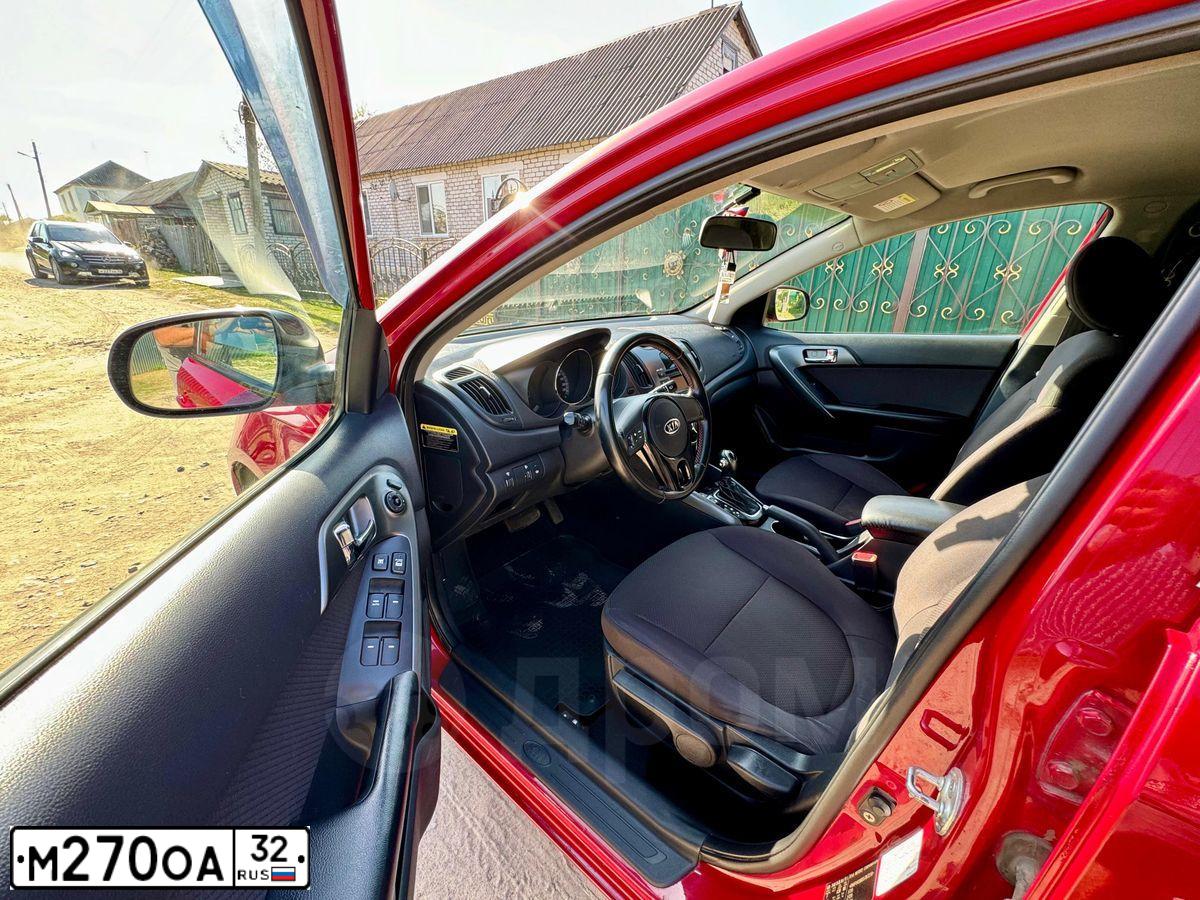 Фото автомобиля KIA CERATO, 2013 — госномер М270ОА32. Цвет: Красный