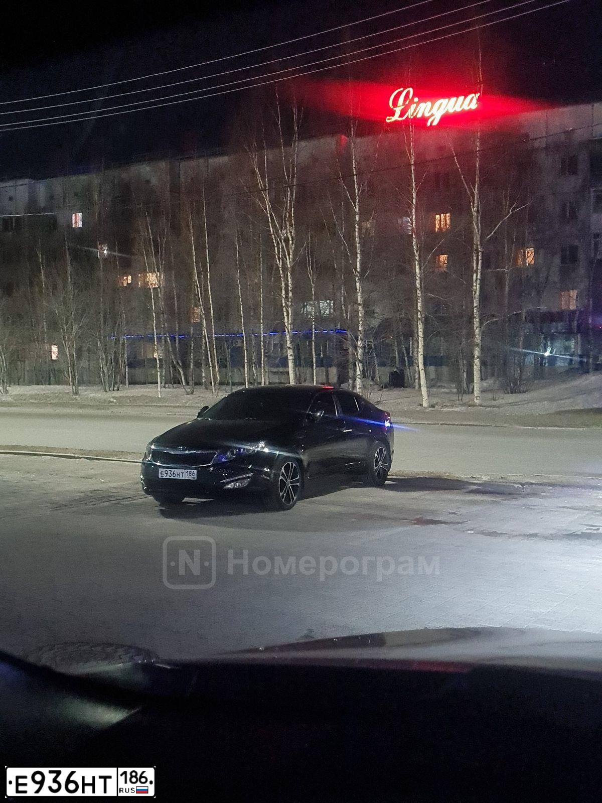 Фото автомобиля KIA MAGENTIS / OPTIMA, 2012 — госномер Е936НТ186. Цвет: ЧЕРНЫЙ